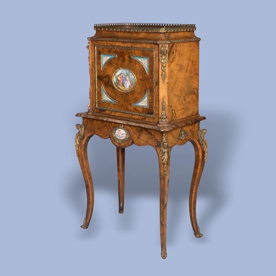 An English Porcelain Mounted Walnut Cabinet In the Louis XV Manner